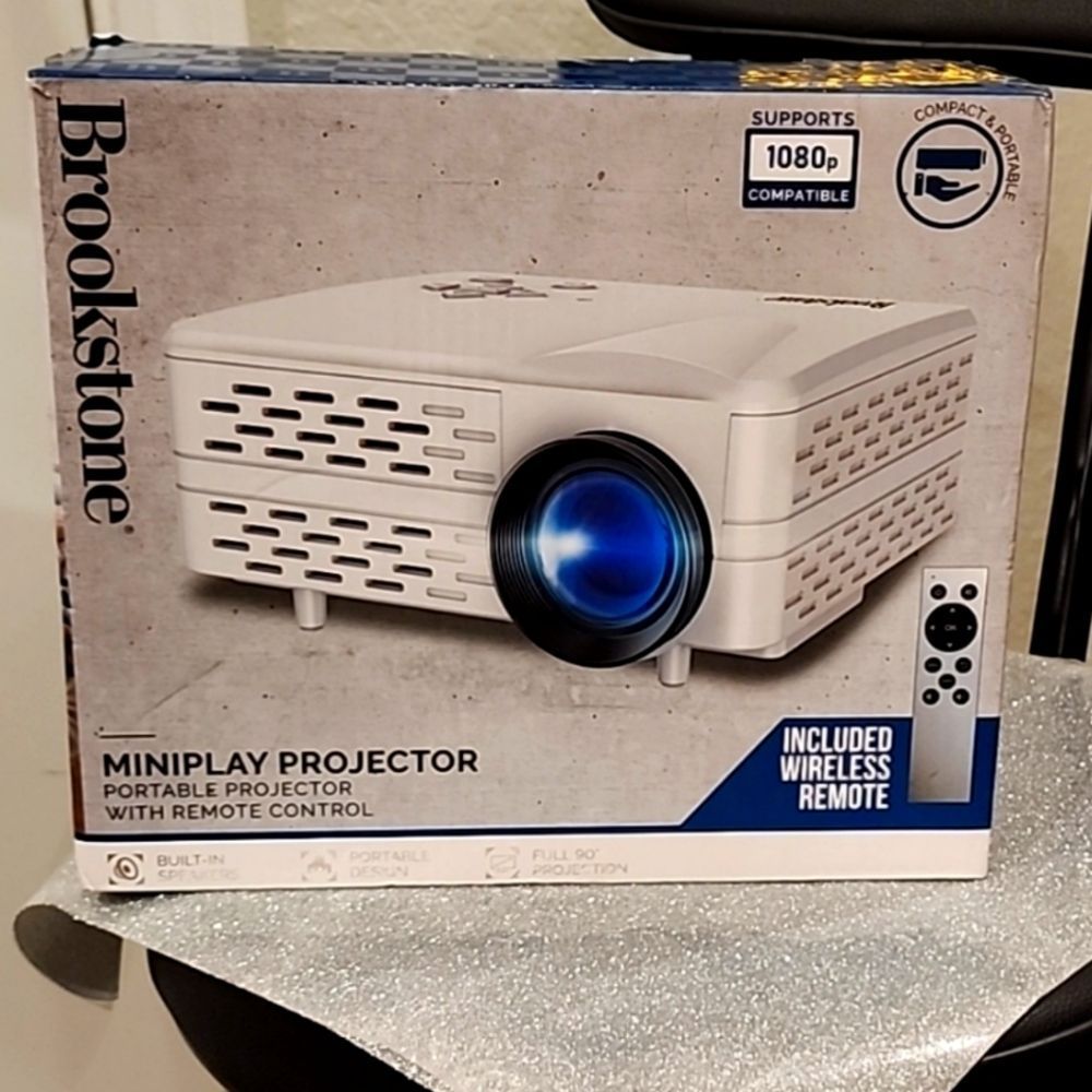 Brookstone MiniPlay Portable Projector w/Remote Control - Picture 7 of 7
